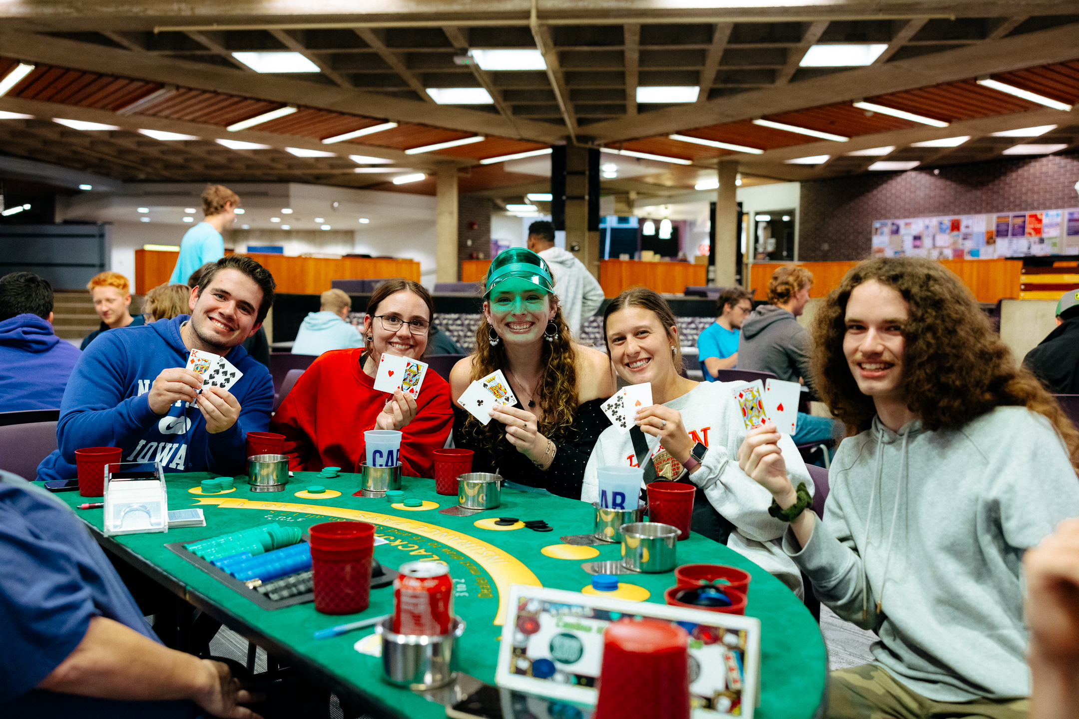 Students sitting at a Blackjack table