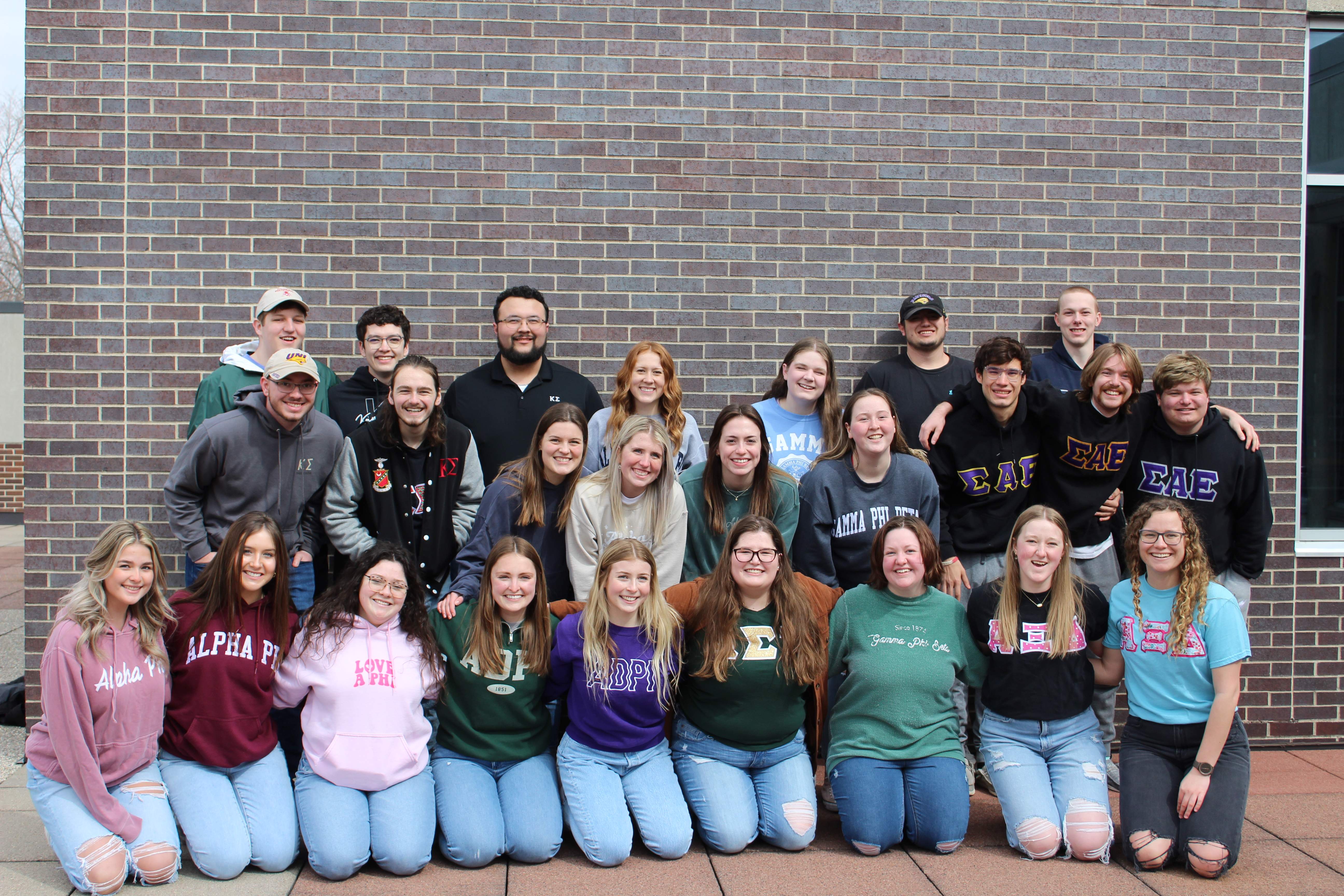 Members of fraternity and sorority life near Maucker Union